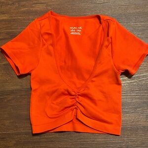 Out From Under  Orange Top